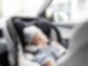 Baby in Autositz