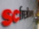 Das SC Freiburg Logo an einer Wand.