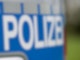 Das Wort Polizei steht auf der Karosserie eines Volkswagen Caddy.