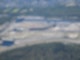 Blick auf das Motodrom auf dem Hockenheimring, aufgenommen aus einem Flugzeug.