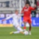 Fußball: Bundesliga, 1. FC Heidenheim - FSV Mainz 05, 32. Spieltag, Voith-Arena. Der Mainzer Jonathan Burkardt (l) in Aktion gegen Heidenheims Kevin Sessa (r).