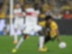 Stuttgarts Silas (l) und Dortmunds Karim Adeyemi kämpfen um den Ball.