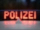 Der Schriftzug «Polizei» auf einem Polizeiwagen.