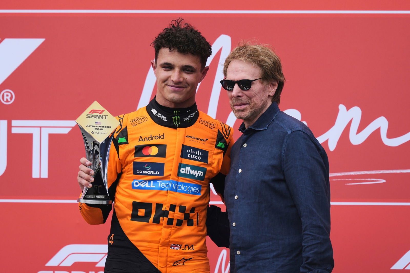Lando Norris (l) findet im Formel-1-Film von Produzent Jerry Bruckheimer Parallelen zum Geschehen in der Rennserie.