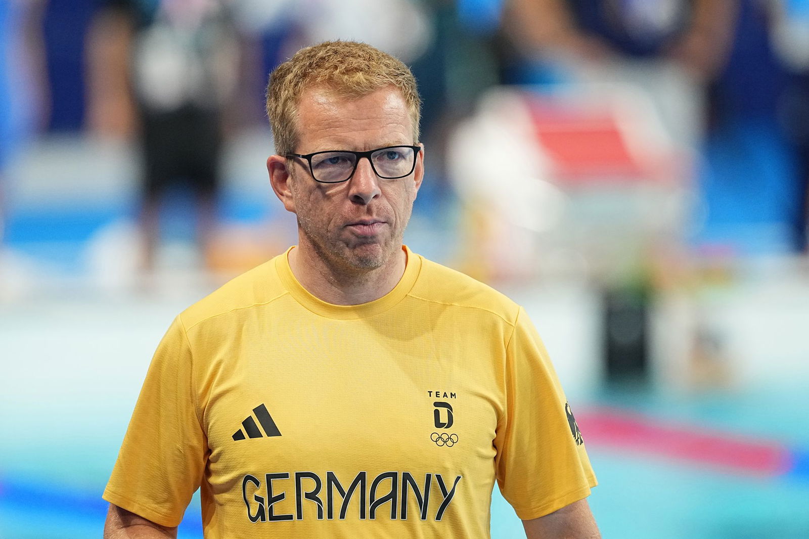 Bundestrainer Bernd Berkhahn hat den Zeitpunkt der ersten Renn-Verschiebung kritisiert.