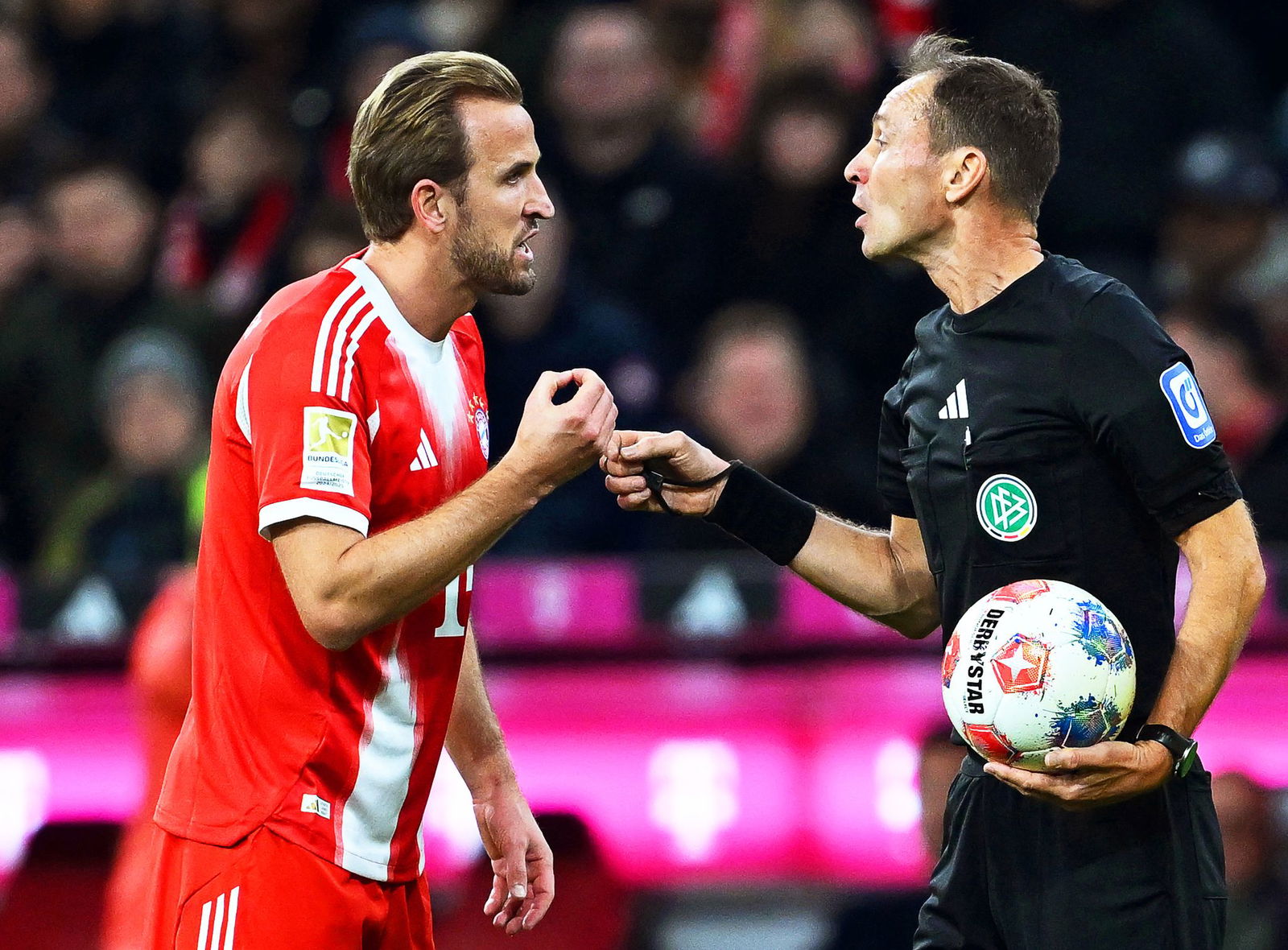 Harry Kane (l) war im Duell mit dem BVB überall im Einsatz.