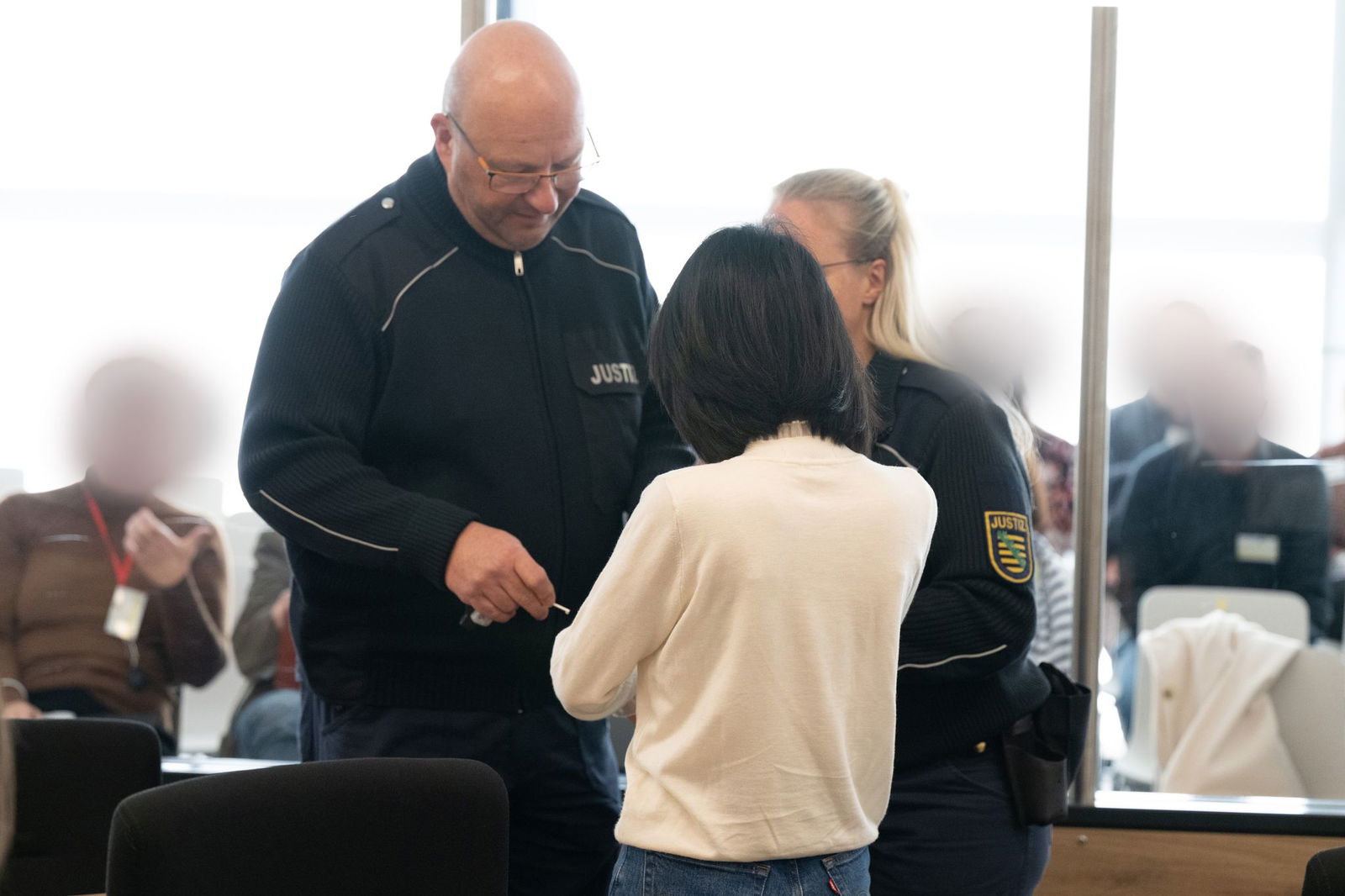 Yaqi X. soll als Komplizin Informationen an G. weitergegeben haben.