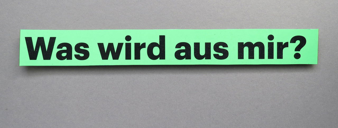Was wird aus mir? Schriftzug