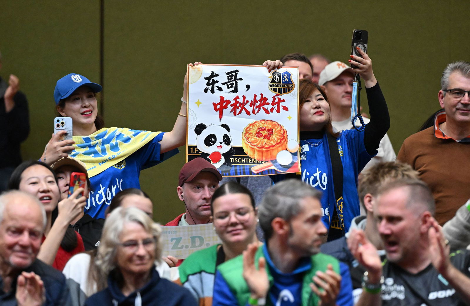Chinesische Fans in der deutschen Bundesliga.