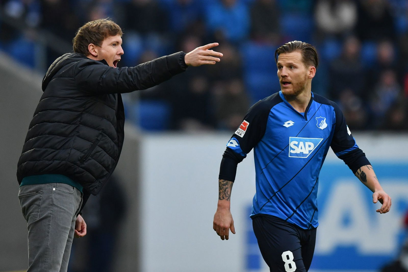 Lang ist es her: Hoffenheims Trainer Julian Nagelsmann mit seinem Spieler Polanski. (Archivbild)