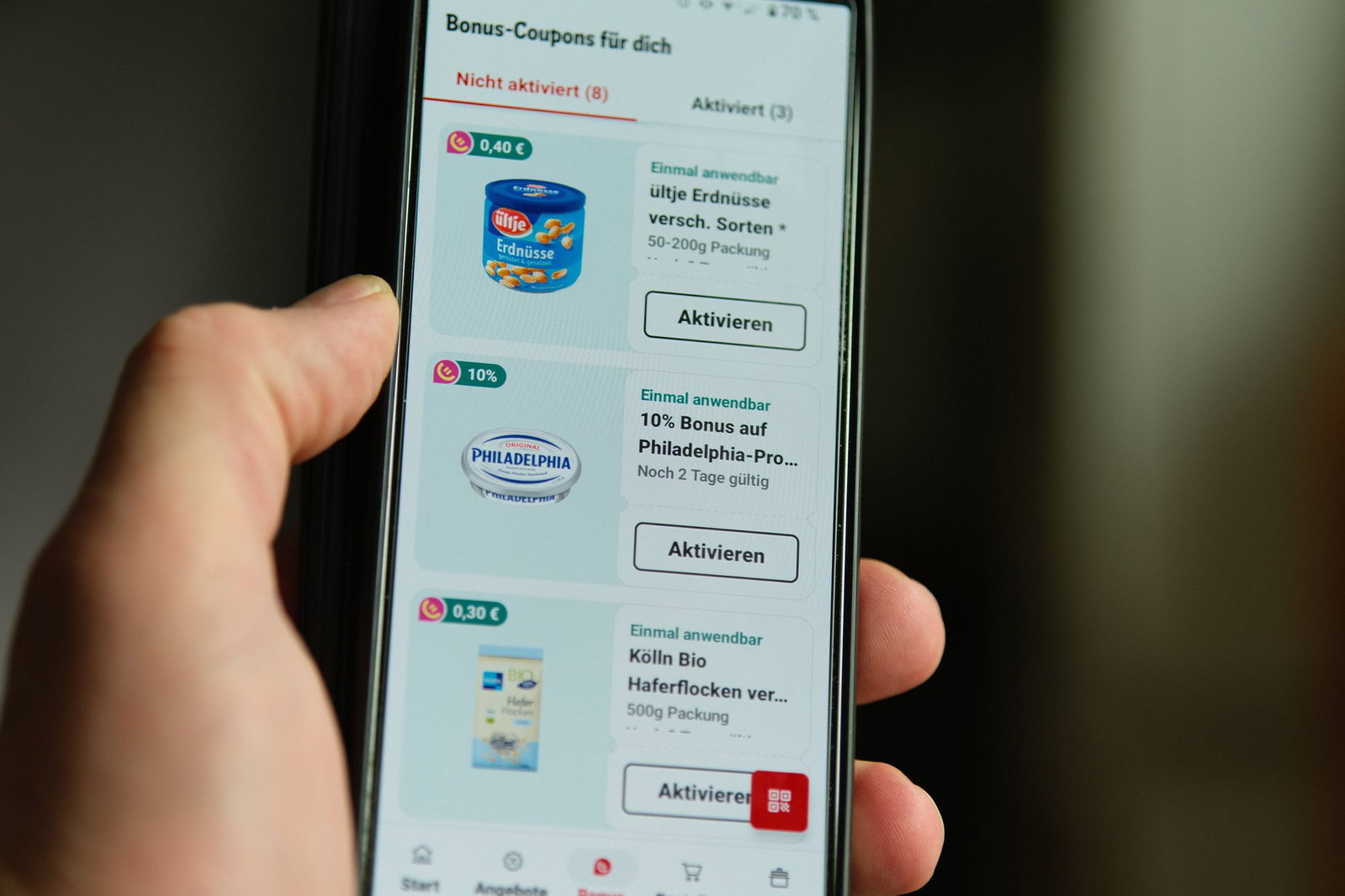 Rewe lockt Kunden mit einem Bonus - der Gesamtpreis der betreffenden Produkte wird nicht angezeigt.