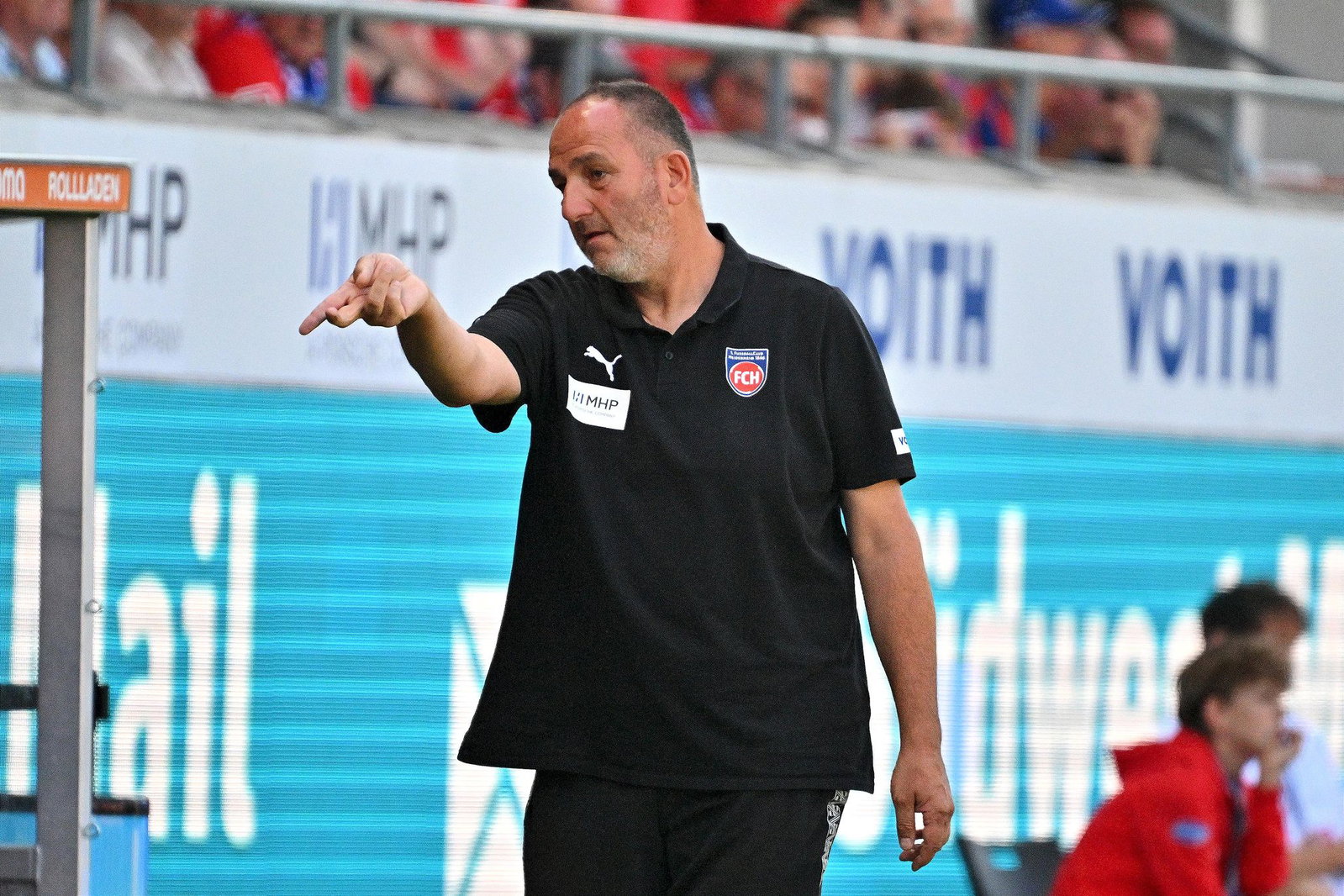 Konnte sich über einen Sieg zum Saisonauftakt freuen: Heidenheims Trainer Frank Schmidt.  