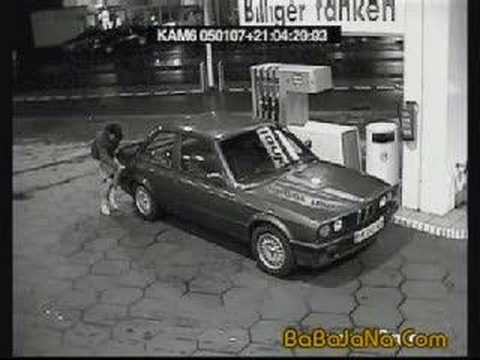 Woman Tanking Gas-this madam tanked gas with style