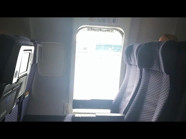 Woman jumps out of taxiing plane