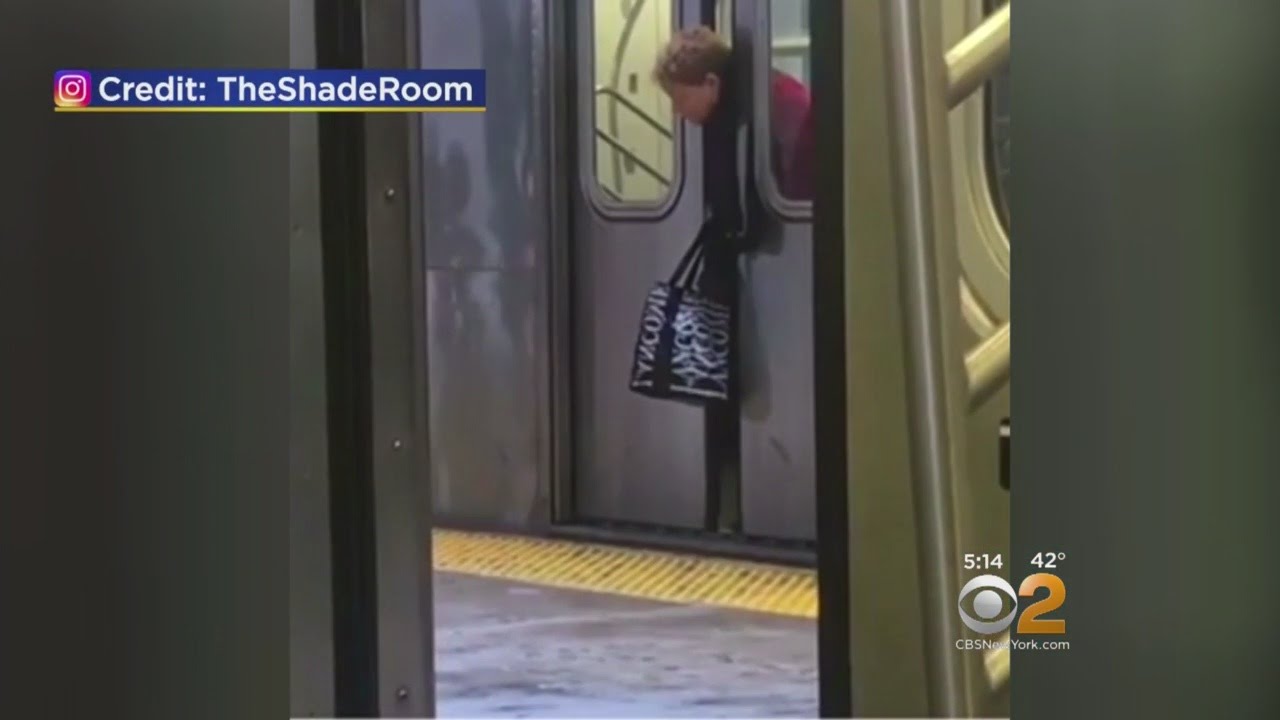 Must See: Woman Gets Stuck In Subway Doors