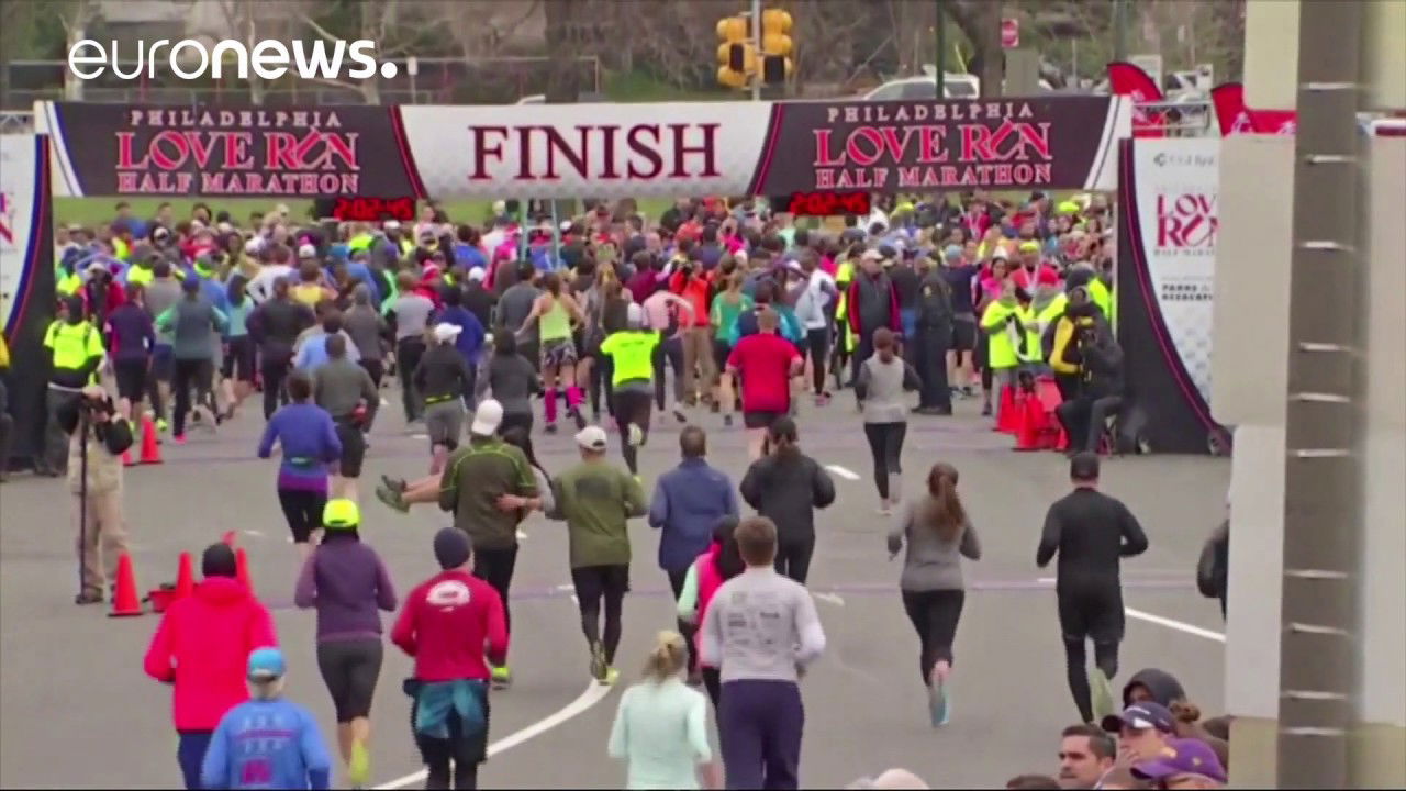 Runner carried across the finish line at Philadelphia half marathon