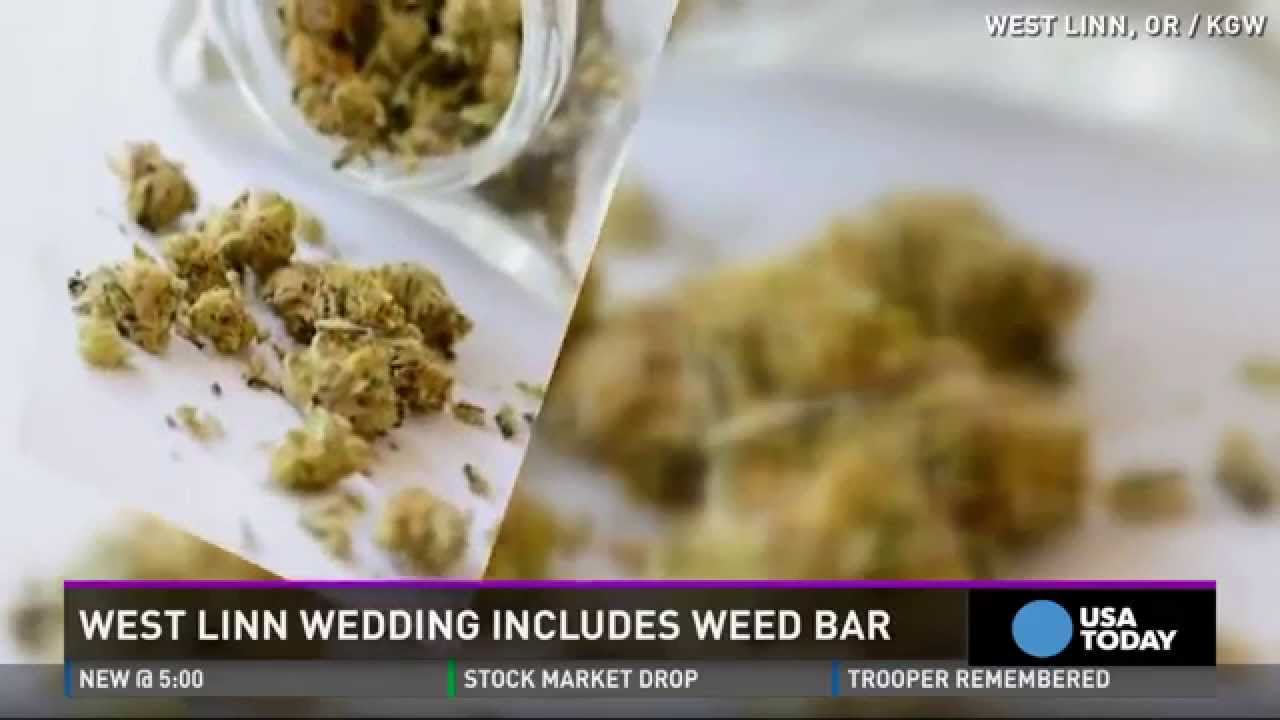 Newlyweds welcome wedding guests with weed tent